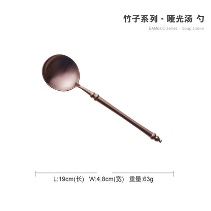 A stainless steel knife and fork set