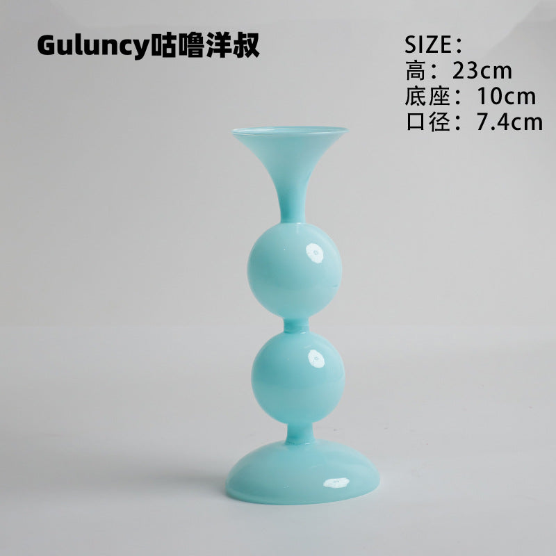 A vintage French Roman column glass candle holder