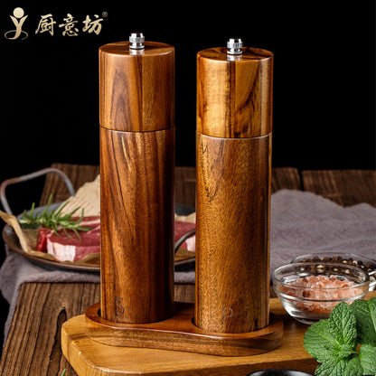 A lobular acacia cylindrical pepper grinder