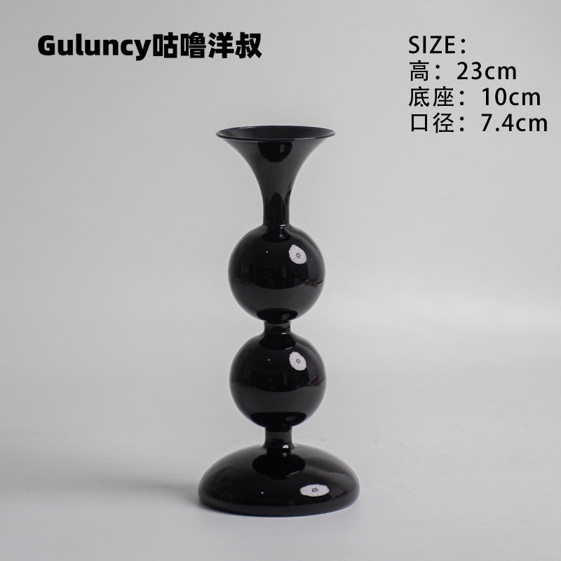 A vintage French Roman column glass candle holder