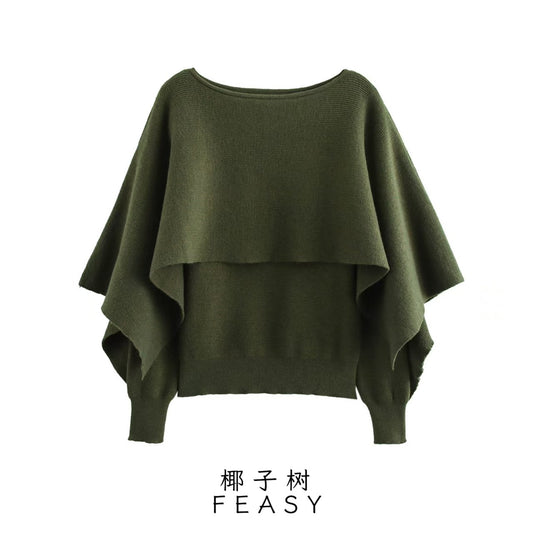 A cape knitted sweater