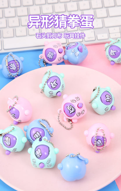 A guessing egg keychain scissors stone cloth face twisting egg