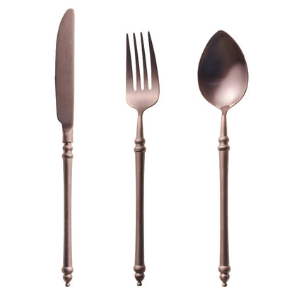 A stainless steel knife and fork set