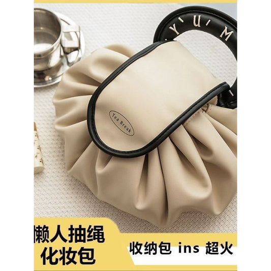 A new lazy drawstring cosmetic bag women's portable waterproof PU travel toilet bag portable storage bag box box