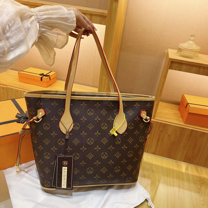 A large-capacity soft leather texture handbag, fashionable printed retro shoulder bag, commuter to work, tablet storage, tote bag.