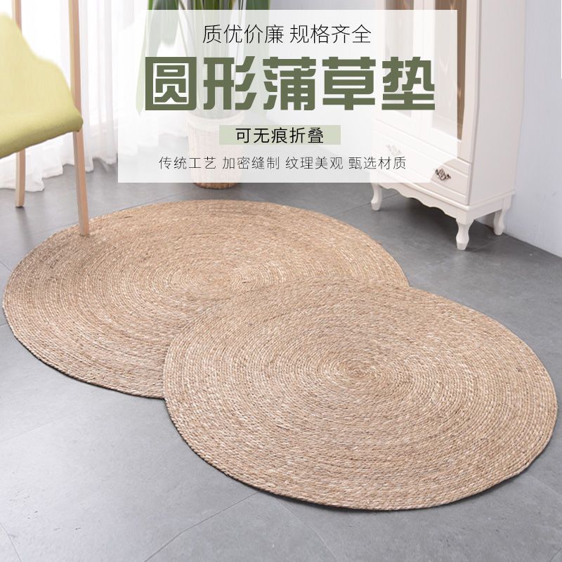 A handmade grass rattan woven carpet floor mat
