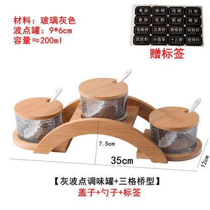 A kitchen seasoning box bamboo cover glass jar