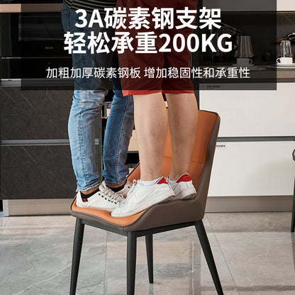 A wrought iron leather chair seat