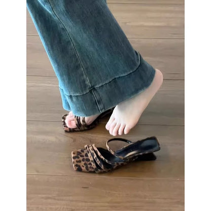 A slope heel leopard print sandals summer wear high heels