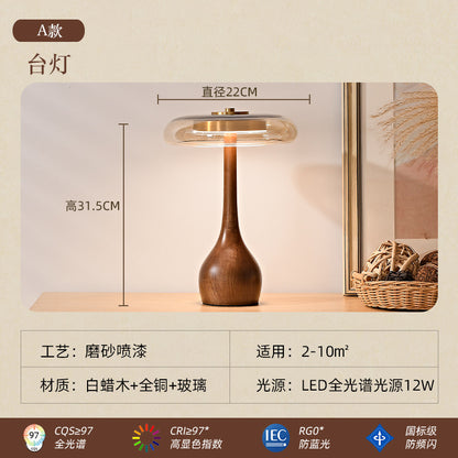 A solid wood glass table lamp