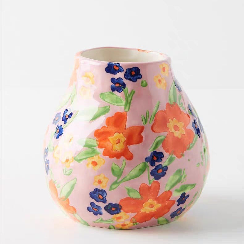 A colorful hand-painted ceramic vase ornament