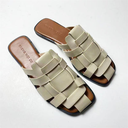A summer hollow women's shoes flat slippers