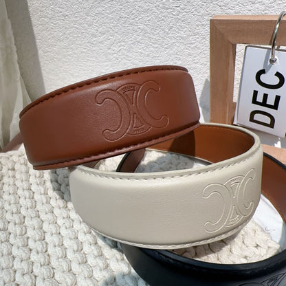 A French high-end sense retro leather letter headband stepping on the line pressing the edge wide edge going out headband heavy industry light luxury hair accessories women