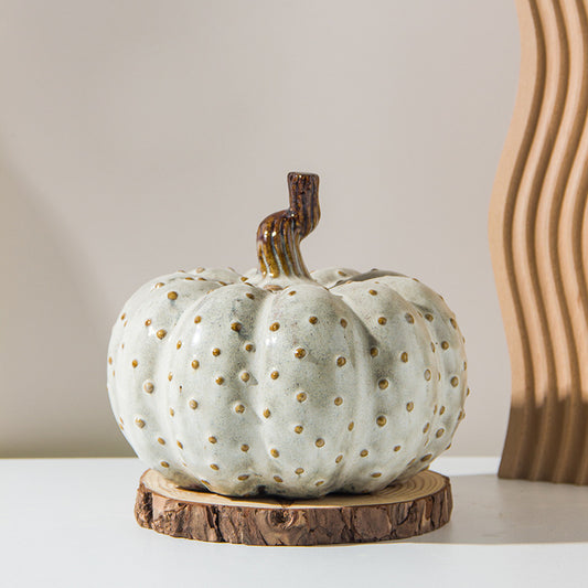 A ceramic pumpkin ornament
