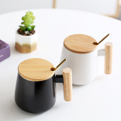 A wooden handle ceramic water cup