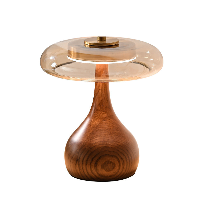 A solid wood glass table lamp