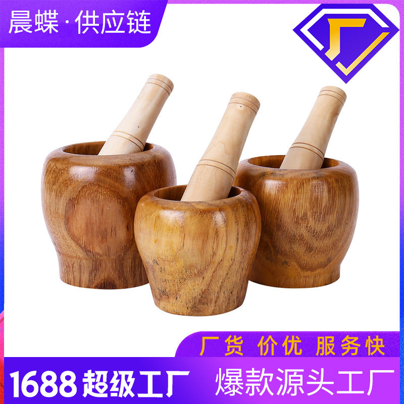 A Solid wood garlic tamper, medicine jar, wooden cup garlic puree