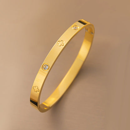 AC European and American cross-border women's electroplated four-leaf clover gold high-end women's jewelry wholesale non-fading jewelry titanium steel bracelet
