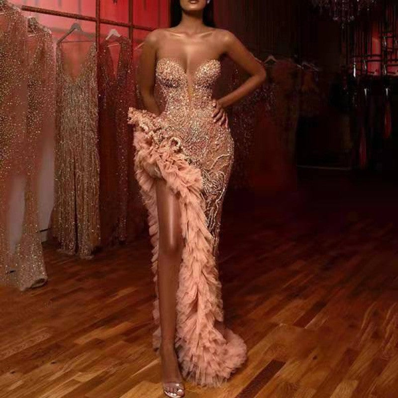 A summer new European and American women's clothing Amazon dress fringed tail sexy gold tube top evening dress