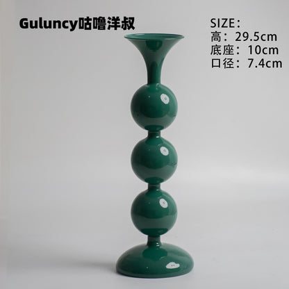 A vintage French Roman column glass candle holder