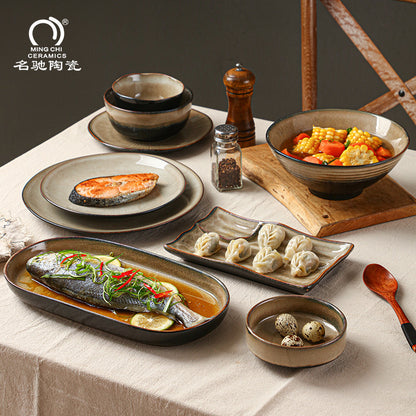 A Japanese-style kiln-changed retro coffee gold creative ceramics simple high-end light luxury cup, bowl, plate and tableware combination set