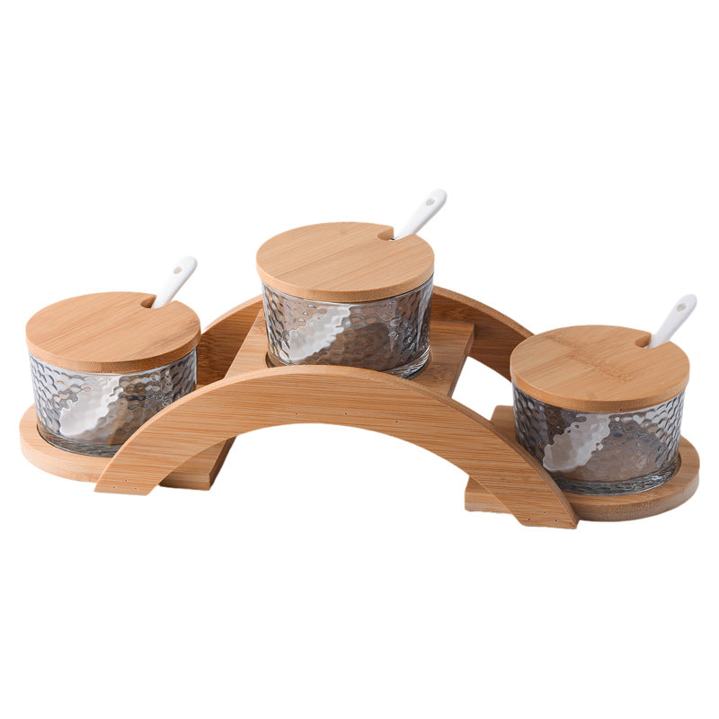 A kitchen seasoning box bamboo cover glass jar