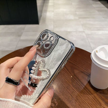 A three-dimensional pearl love mirror mobile phone case