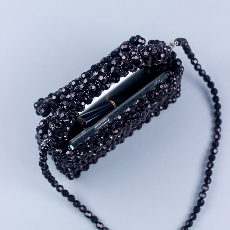 A simple black horn bead acrylic handbag bag handmade beaded woven portable messenger bag