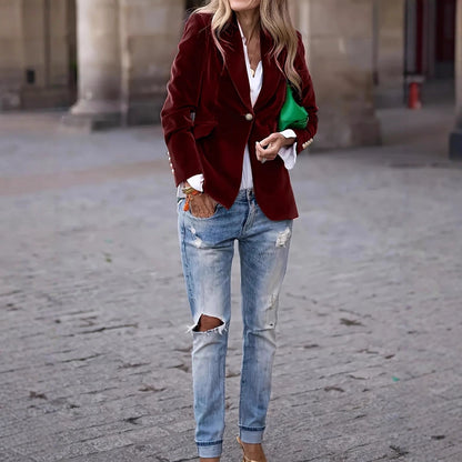 A gold velvet blazer