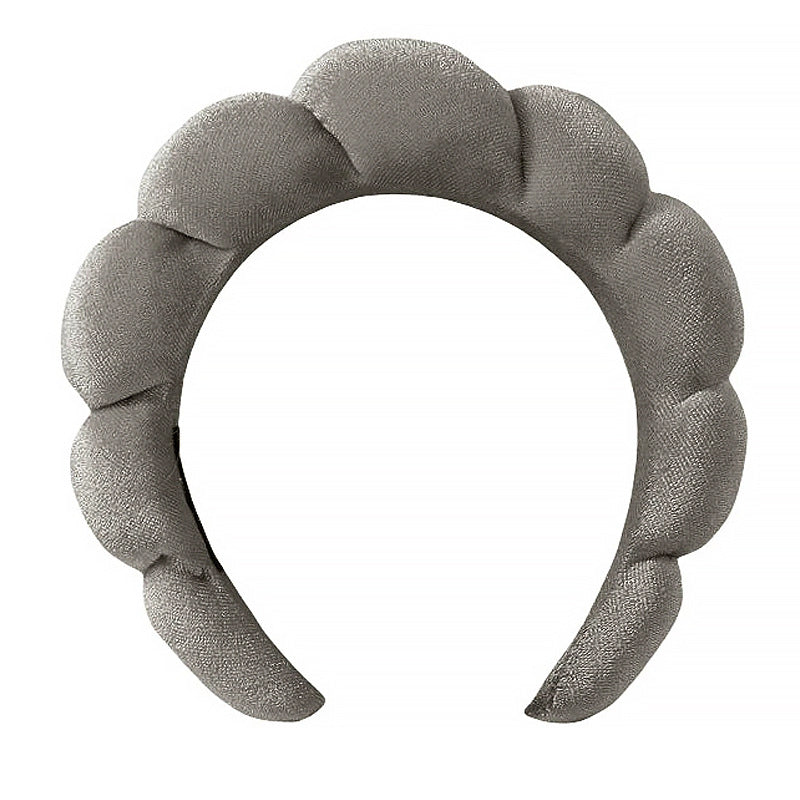 A towel fleece sponge twist headband