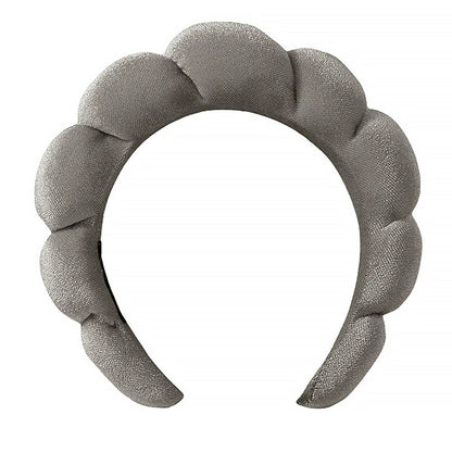 A towel fleece sponge twist headband