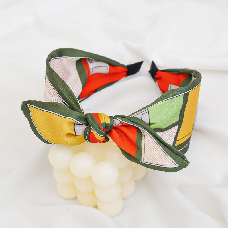 A Korean version of the new product headband fashion calico geometric wide edge headgear hair bundle go out bow hairpin