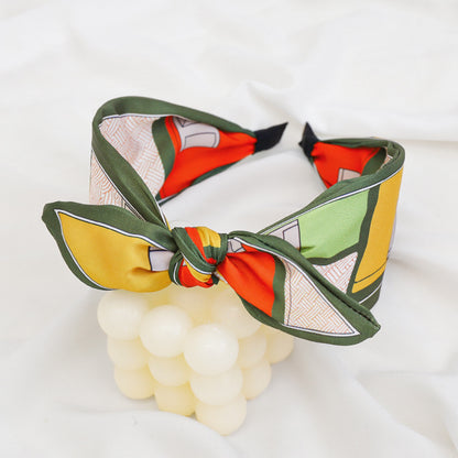 A Korean version of the new product headband fashion calico geometric wide edge headgear hair bundle go out bow hairpin