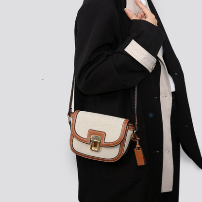 A autumn new Korean niche contrasting color single shoulder diagonal span saddle bag retro versatile underarm small bag women