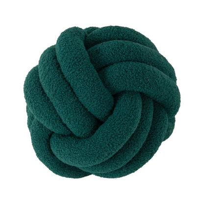 A braided knotted ball pillow