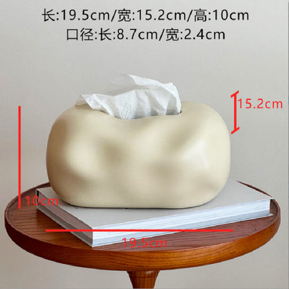 A ceramic tissue box ornament