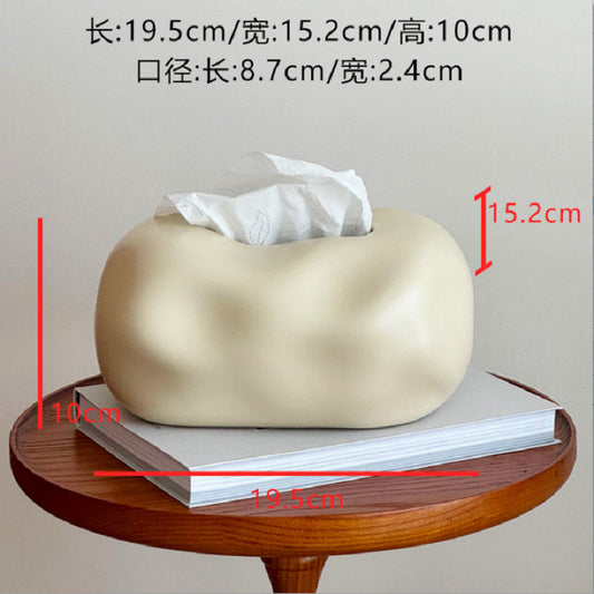 A ceramic tissue box ornament