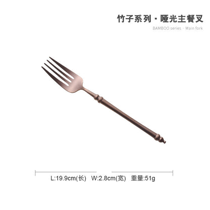 A stainless steel knife and fork set