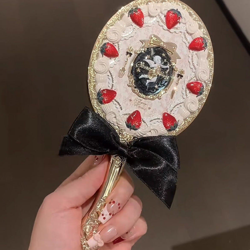 A Little Angel Handheld Mirror