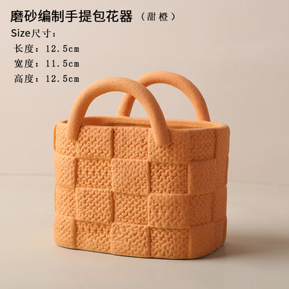 A ceramic handbag vase ornament