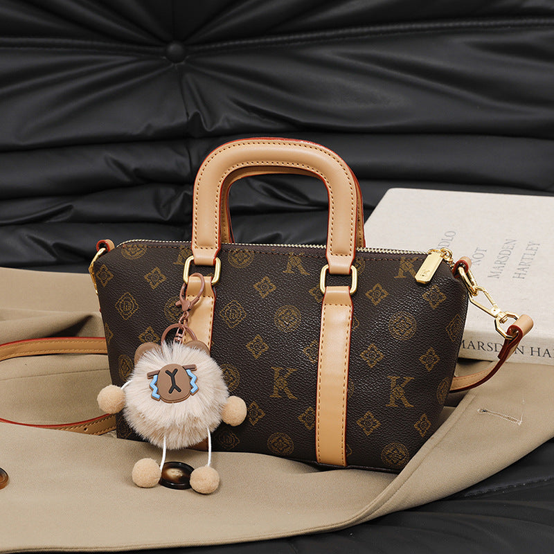 A new Korean version temperament high sense vegetable basket retro fashion presbyopia shoulder messenger bag