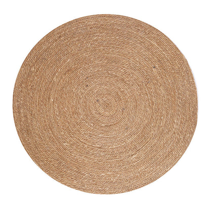 A handmade grass rattan woven carpet floor mat