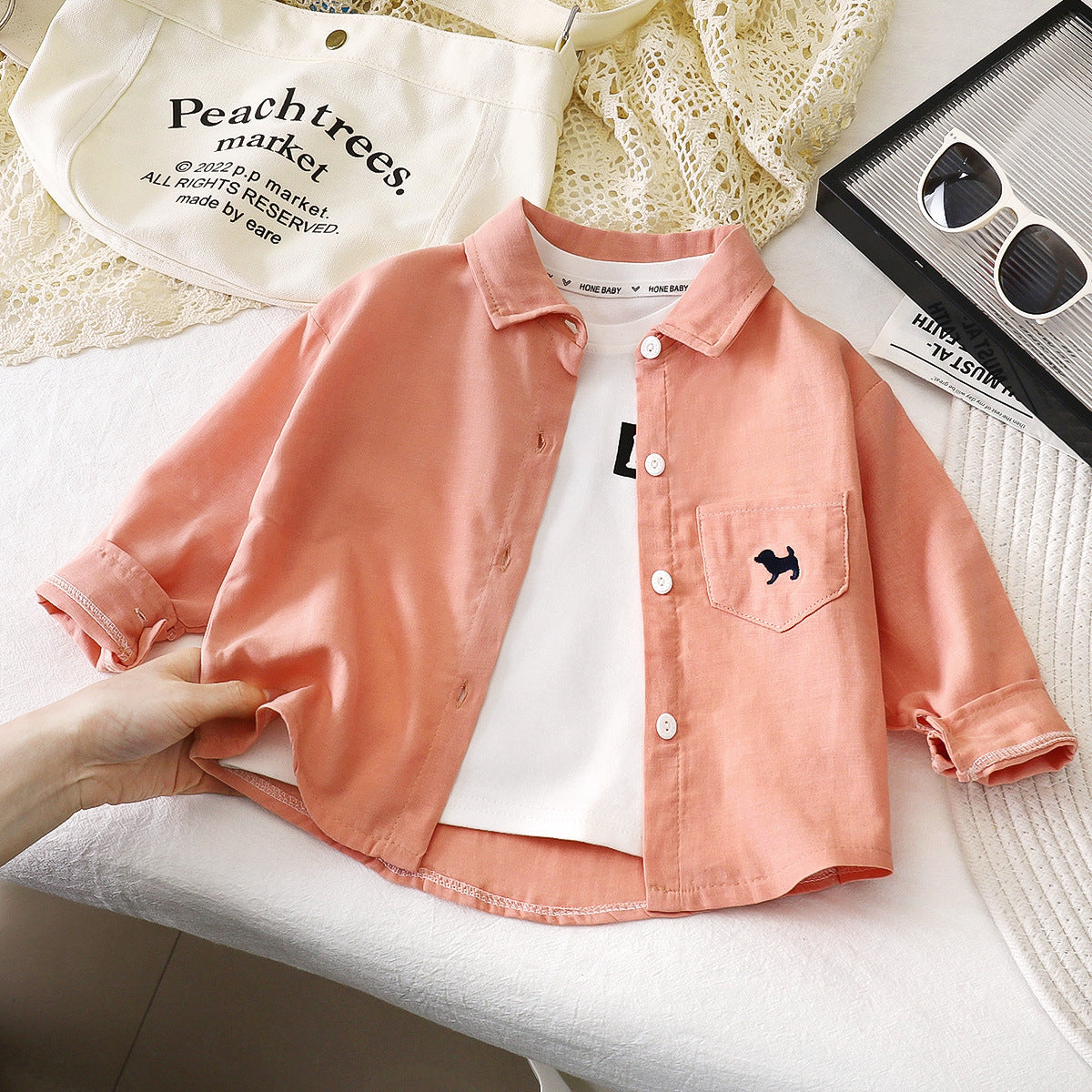 A children's long-sleeved shirt