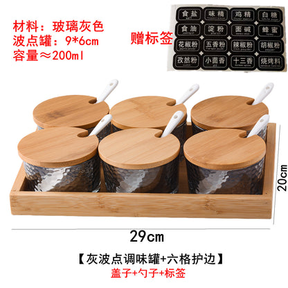 A kitchen seasoning box bamboo cover glass jar
