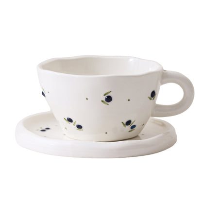 A Embossed Ceramic Coffee Cup and Saucer Set