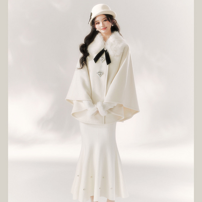 A Cape Coat and Skirt Set
