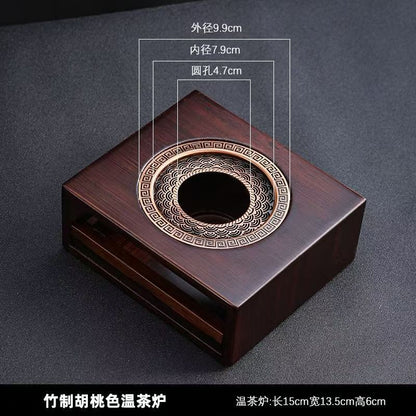 P The base of the tea stove is heated and kept warm